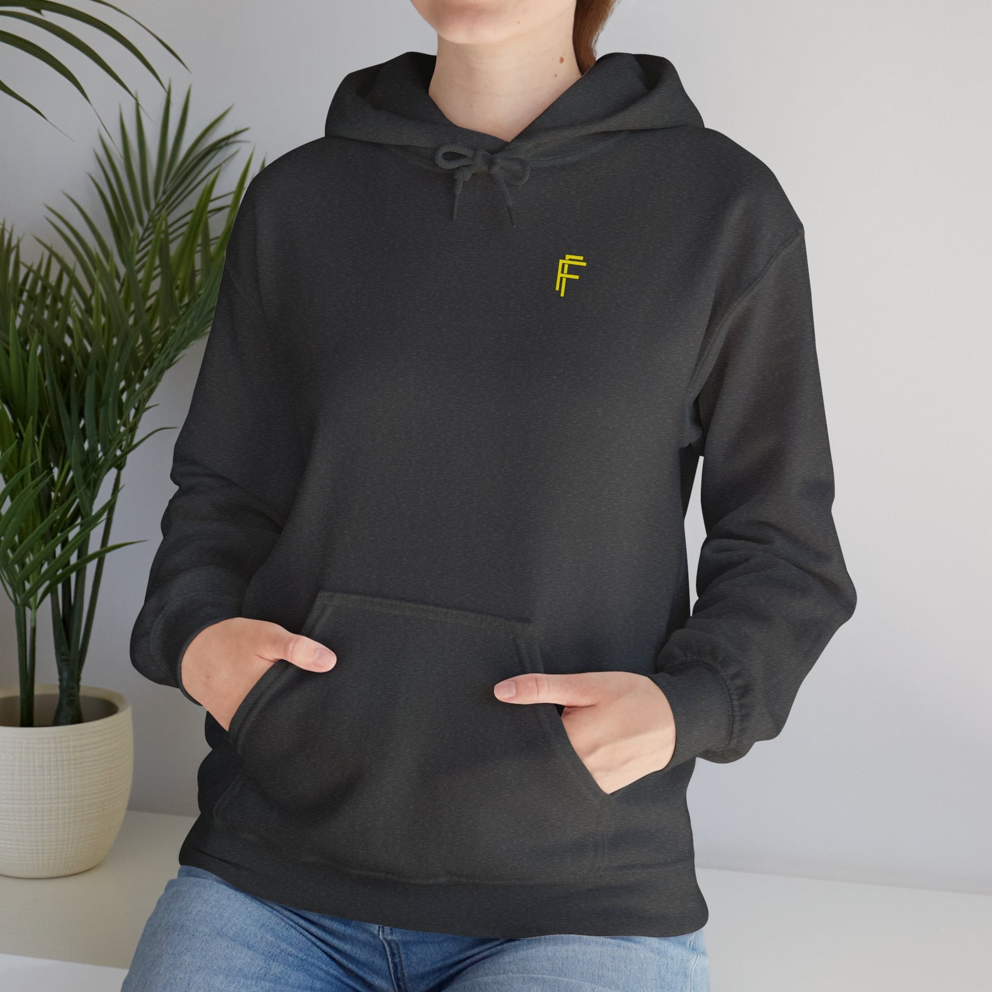 Frenzy Unisex Heavy Blend Hoodie with yellow Logo and Large text on the back. - Fitness Frenzy